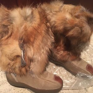 Coyote fur boots. Never worn.